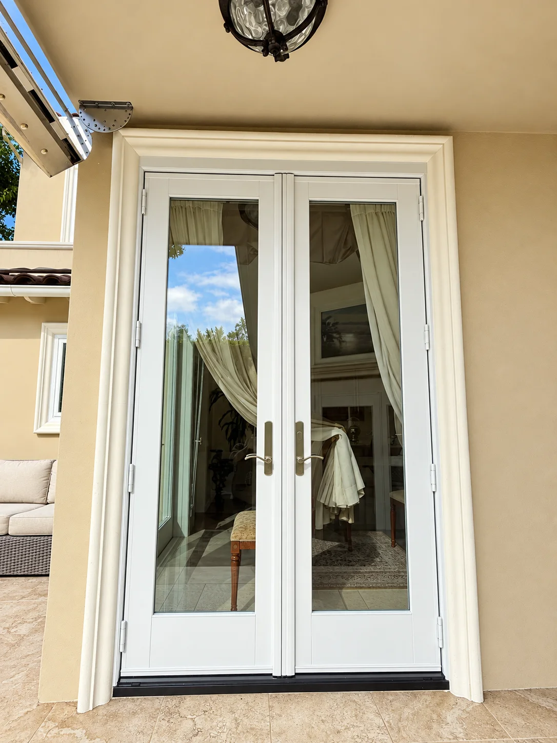 Andersen A-Series French Doors With Antique Brass Hardware